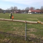 A community service volunteer cleans up Crooksville Village Park