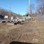 Some community service volunteers help clean and maintain the New Straitsville Community Garden.