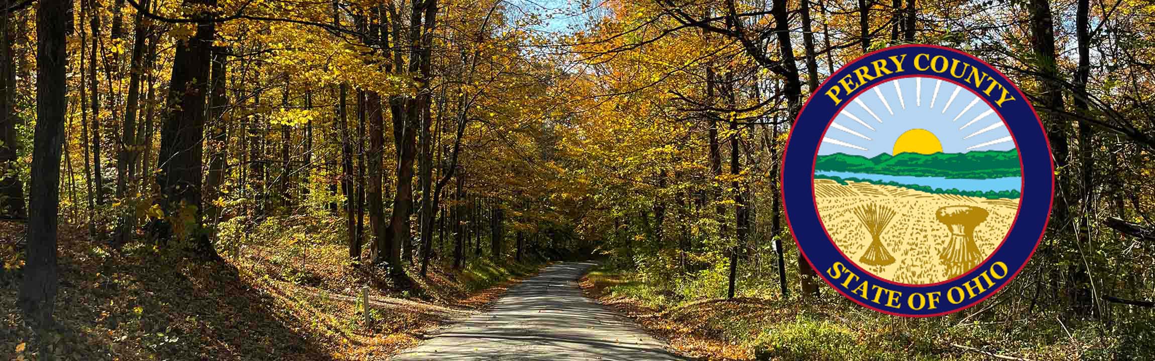 Perry County country road in fall with overlay of the County Seal in the State of Ohio.